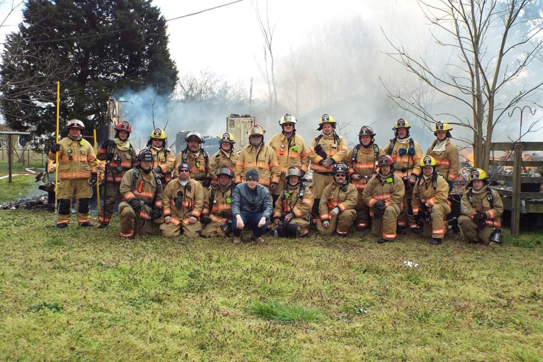 Firefighters participating in live-fire training